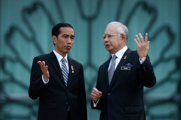 Photographie des présidents indonésien et malaisien