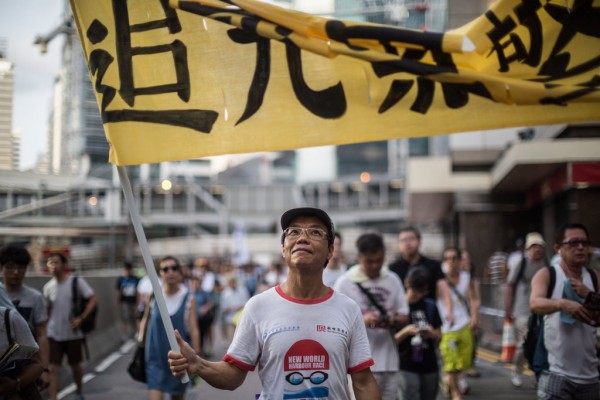 Portrait d’un manifestant le 1er juillet 2015, date anniversaire de la retrocession de Hong Kong à la Chine, lors d’une manifestation pro-démocratique à Hong Kong