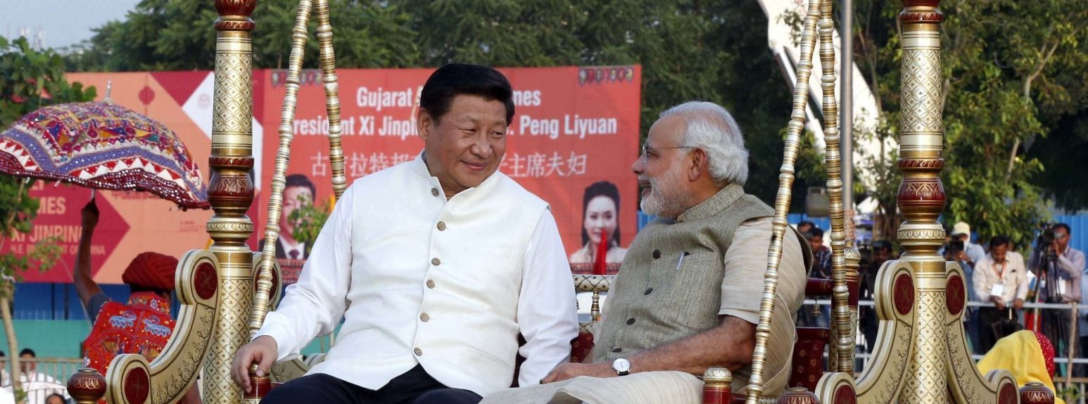 Le président chinois Xi Jinping et le Premier ministre indien Narendra Modi dans l'État du Gujarat en Inde en 2014. (Source :SCMP)