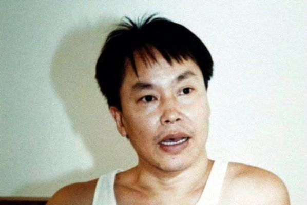 Le gangster hongkongais Cheung Tze-keung, dit "le Flambeur", en prison en 1995. (Source : Apple Daily)