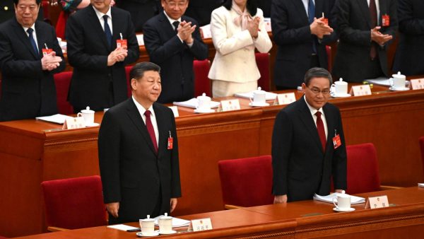 Le président chinois Xi Jinping et son Premier ministre Li Qiang à l'ouverture de la session annuelle de l'Assemblée nationale populaire, le 5 mars 2024 à Pékin. (Source : CNN)