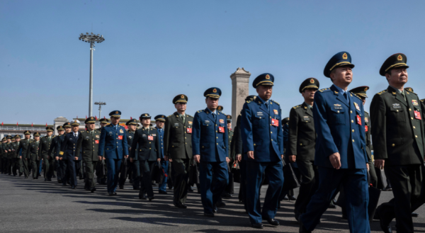 Délégués militaires à la double session parlementaire annuelle à Pékin, le 5 mars 2024. (Source : ISS)